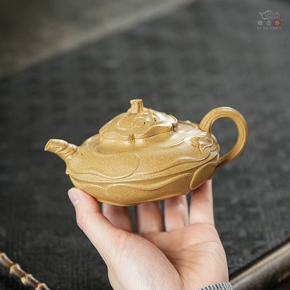Yihu Chun handmade wind roll sunflower purple clay pot raw ore gold section teapot